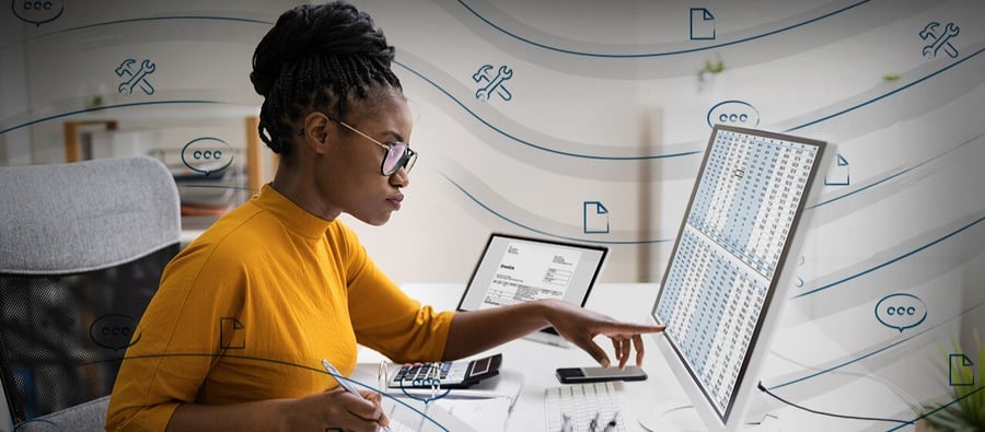 Professional Woman Pointing At Computer Screen and Working